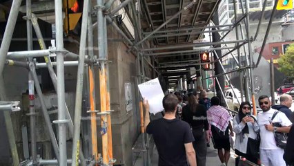 Walking under the mostly enclosed construction tunnel on yonge street (a real industrial look and feel)
