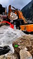 Excavator vs Raging River