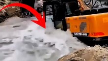 Excavator vs Raging River