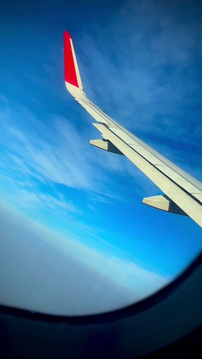 Airplane flying on Deep Blue Sky