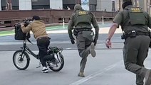 Man evades ICE agents on pedal bike in downtown Chicago chase