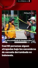 Casi 60 personas siguen atrapadas bajo los escombros de escuela derrumbada en Indonesia