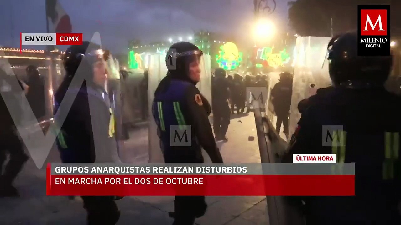 Hombres con el rostro cubierto roban joyería durante la marcha del 2 de octubre