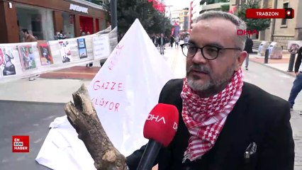 Gazze’de ölen bebeklere dikkat çekmek için kefenli eylem yaptı