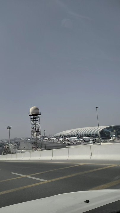 beautiful view of terminal 3 Dubai airport and Emirates headquarters