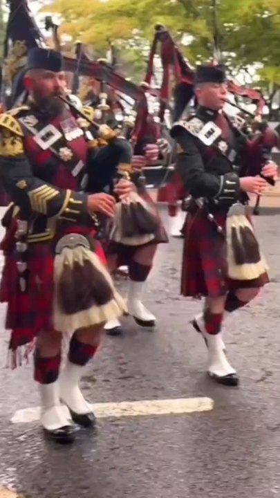 Soldiers March Through Stormy Rain with Bagpipes Blasting! 💙🏴