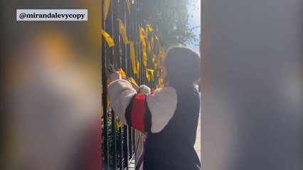 Woman filmed cutting ribbons commemorating Israeli hostages