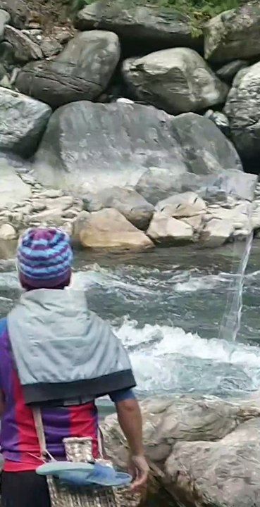 cast netting in Nepal | himalayan trout fishing with handmade cast net |