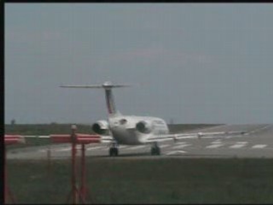 Take-off Fokker100 Brit-Air F-GPXD  at the airport of Rennes