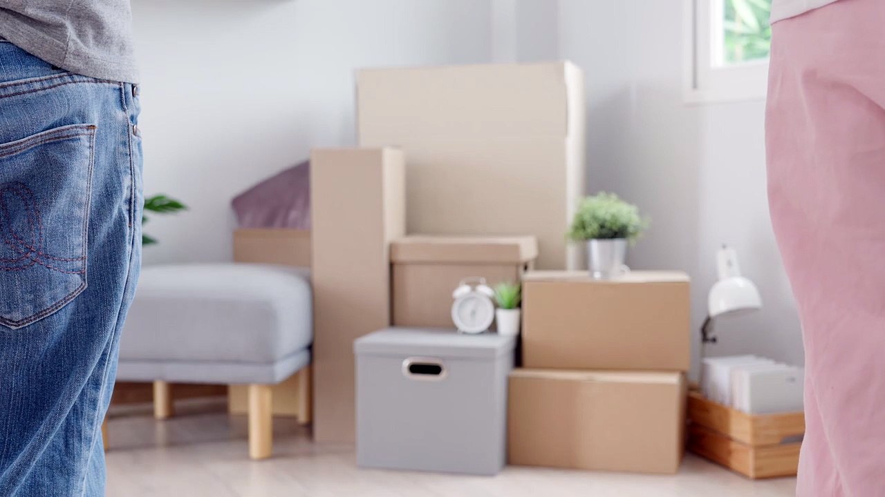 vecteezy_moving-house-relocation-couple-hold-key-house-keychain-in_17515813(1)