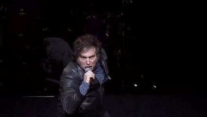 Argentine President roars his way through rock concert after $20bn bail out from the US