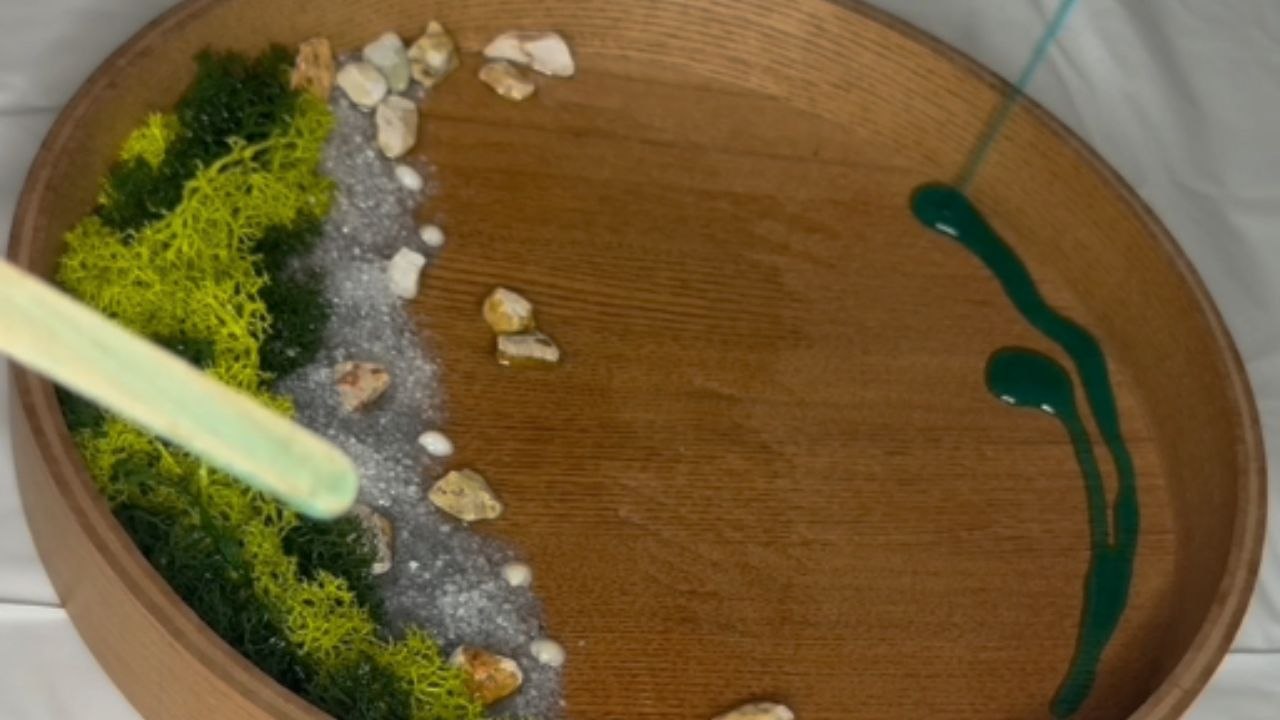 Ocean-inspired resin tray artwork preserves the beauty of waves meeting the shore in perfect form