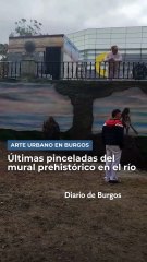 Últimas pinceladas en Burgos al mural prehistórico en el río Arlanzón