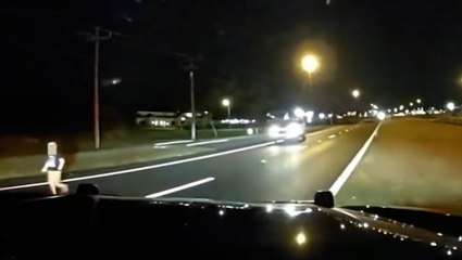 Police save toddler running down side of Florida highway at night
