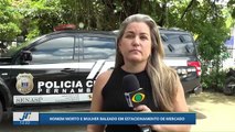 Homem morto e mulher baleada em estacionamento de mercado