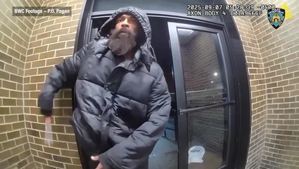 Moment man attacks police officer with 14-inch knife after wandering into NYPD station