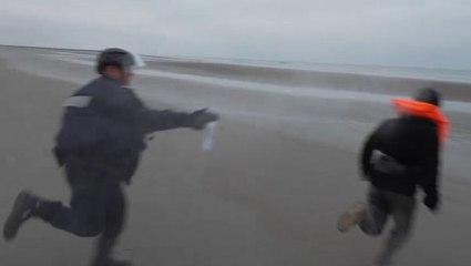 French police use pepper spray on migrants trying to cross English Channel