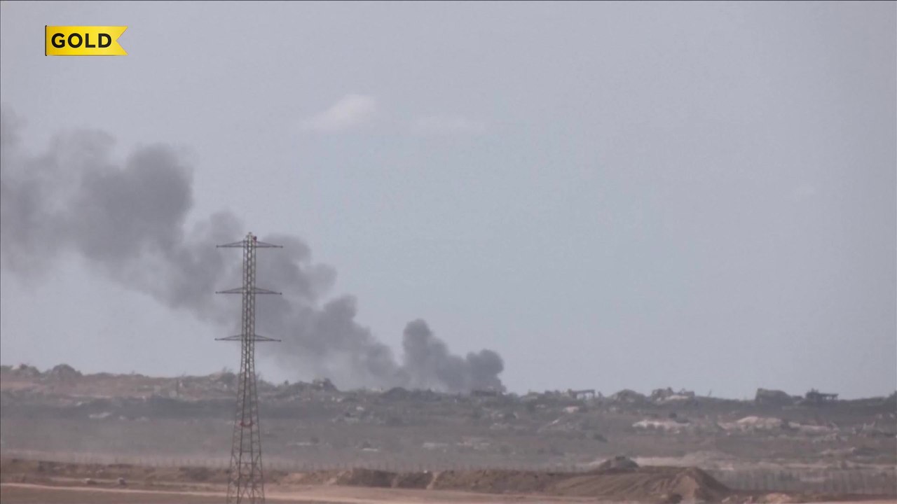 Black smoke fills Gaza skyline day after ceasefire starts