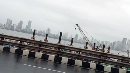 Driving in Mumbai, India on The Bandra–Worli Sea Link Bridge, Rainy Day, Skyline From a Distance