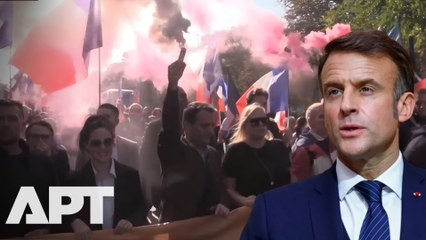 ‘Clings to Power Like a Madman’: Macron Slammed by Furious French Crowd | APT