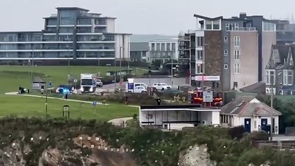 An aerial ladder platform is being used to battle the blaze at the former Narrowcliff Hotel