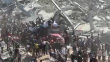 Palestinians surround Gaza aid truck in desperate bid to gather supplies