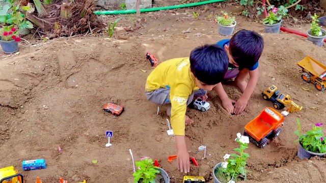 Excavator Digging Hidden Characters in Sand | Toy Trucks & Cranes for Kids Fun
