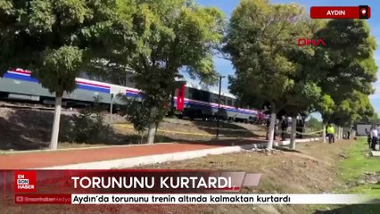 Aydın'da torununu trenin altında kalmaktan kurtardı