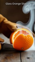 Cinematic ASMR: Cutting a Glowing Glass Orange in Slow Motion 🍊