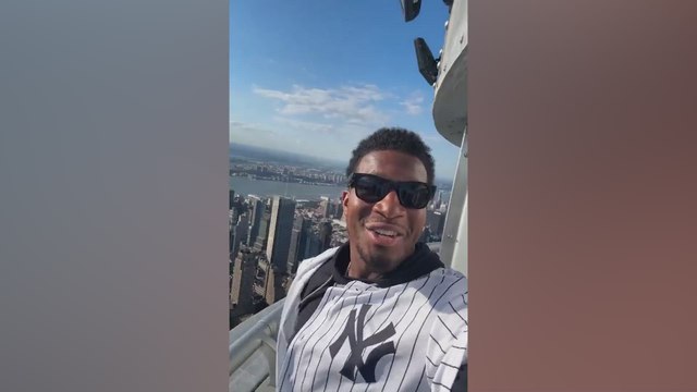 Russell Wilson sings “Empire State of Mind” from the Empire State Building