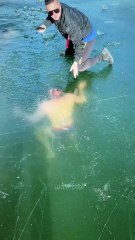 Swimmer Disappears Under Ice