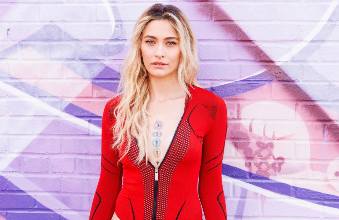 Paris Jackson has compared the men who run her late father Michael Jackson's estate to the Wizard of Oz