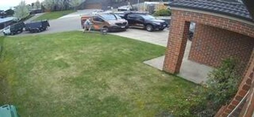 Van Suddenly Rolls Back and Man Rushes to Control It