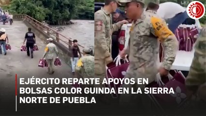 Ejército reparte apoyos en bolsas color guinda en la Sierra Norte de Puebla