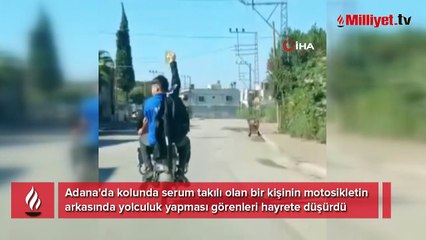 Adana'da şok eden manzara! Serum takılı halde motosikletle yolculuk yaptı