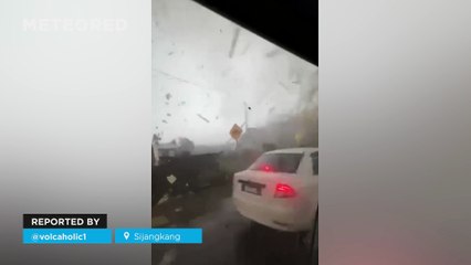 A tornado wreaks havoc in Sijangkang, Malaysia. Several people were injured