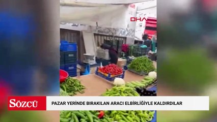Kağıthane'de tezgah açamayınca pazar yerinde bırakılan aracı elbirliğiyle kaldırdılar; o anlar kamerada