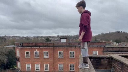 Daring lad attempts roof flip but under-rotates and ends up with a hurt wrist