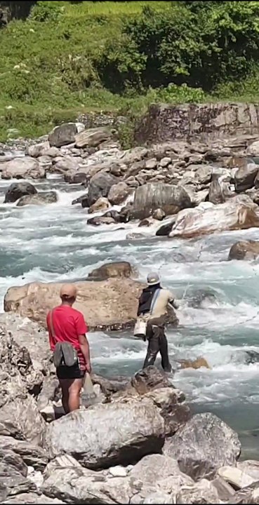 cast netting in Nepal | himalayan trout fishing with handmade cast net |