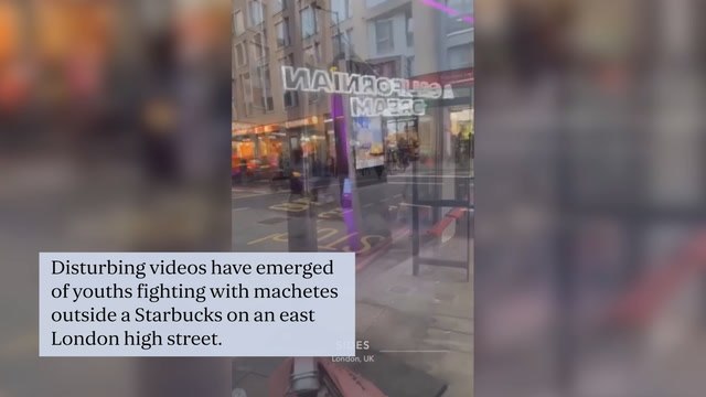 Shocking moment young boys with machetes brawl on busy high street in east London