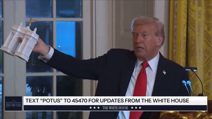 Trump shows off model of proposed Washington DC arch for America’s 250th anniversary