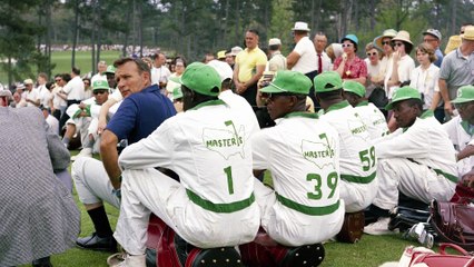 Why Caddies Wear White Boiler Suits?