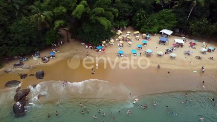 Tiny Secluded Beach outside of A small Brazilian City. Tropical beauty and Clear Water. People Enjoy