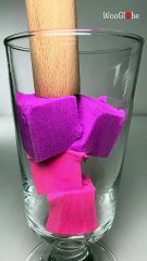 Satisfying pouring of colorful kinetic sand into glass layer after layer
