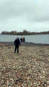 Police carry out a drugs raid in Ramsey