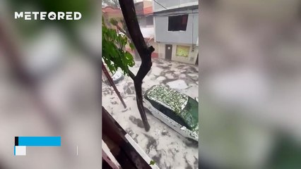 A huge hailstorm covers the streets of Tarija, Bolivia, in white