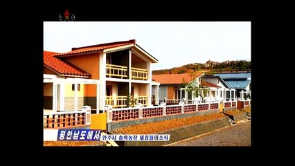 Mudança para novas moradias na Fazenda Songhak da cidade de Anju