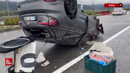 Bursa'da su birikintisine giren otomobil takla attı