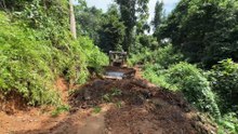 Bulldozer D6R XL Walking Home on the Mountain Plantation Road