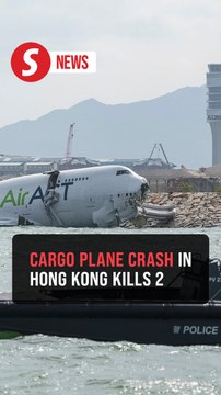 Cargo plane skids off runway into sea at Hong Kong Airport, two killed